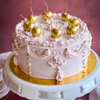 Pink wedding Cake With Cherries on Top